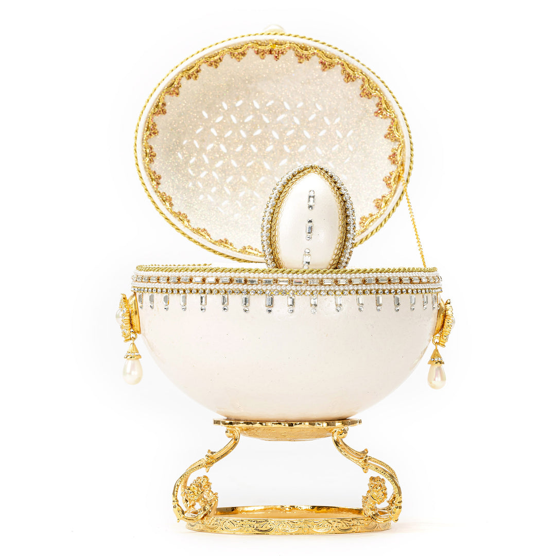 The Egg Fantasy Ostrich w/Mini Egg Music Box part of the  exquisite Egg Fantasy collection is handcrafted in the USA from natural ostrich, emu, goose, duck, and quail eggs. Image #2