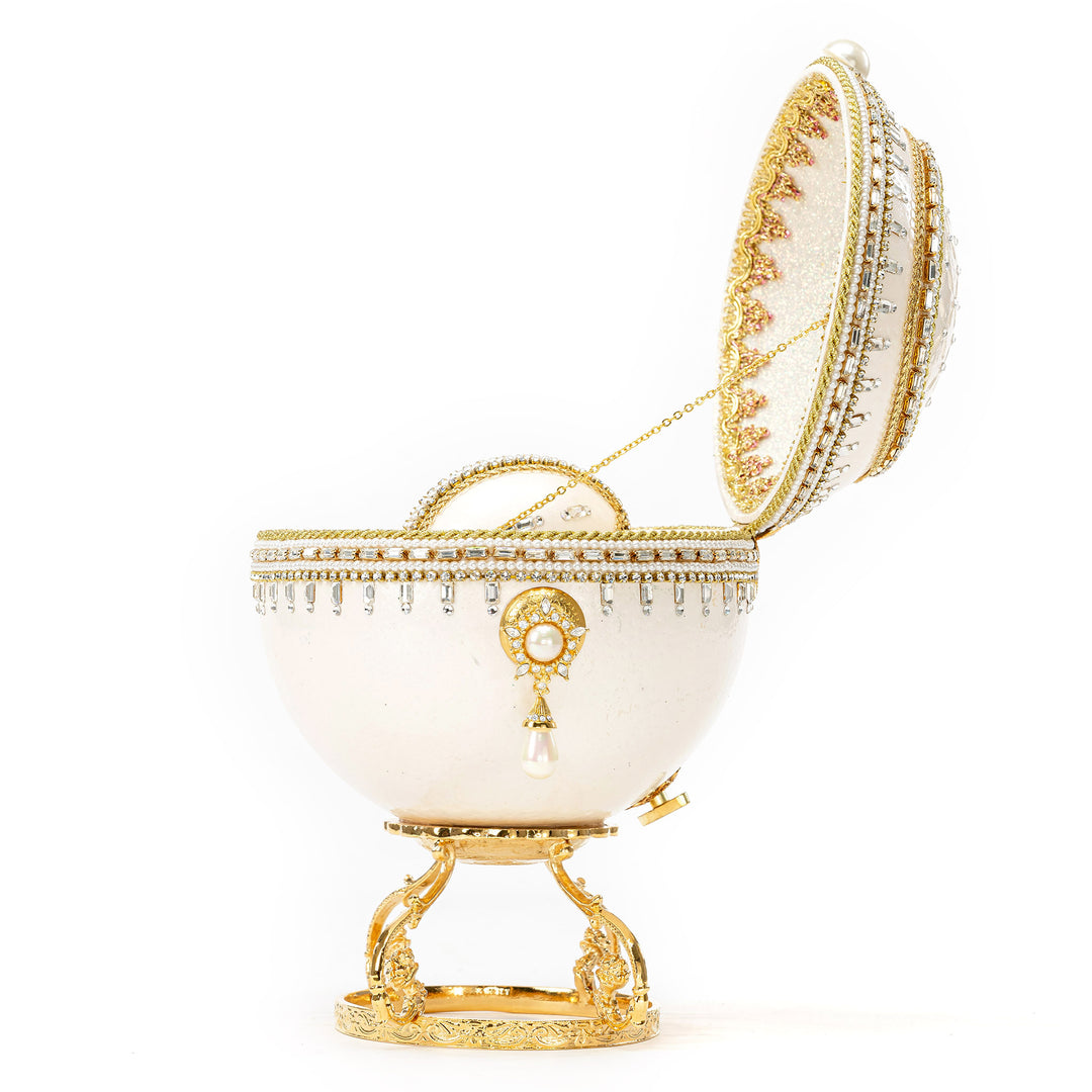 The Egg Fantasy Ostrich w/Mini Egg Music Box part of the  exquisite Egg Fantasy collection is handcrafted in the USA from natural ostrich, emu, goose, duck, and quail eggs. Image #3