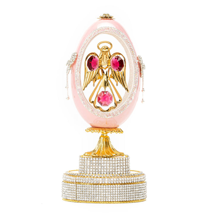 The Egg Fantasy Pink Goose Egg w/Angel Musical part of the  exquisite Egg Fantasy collection is handcrafted in the USA from natural ostrich, emu, goose, duck, and quail eggs. Image #3