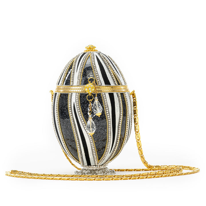 The Egg Fantasy Emu Egg & Crystal Purse part of the  exquisite Egg Fantasy collection is handcrafted in the USA from natural ostrich, emu, goose, duck, and quail eggs. Image #1