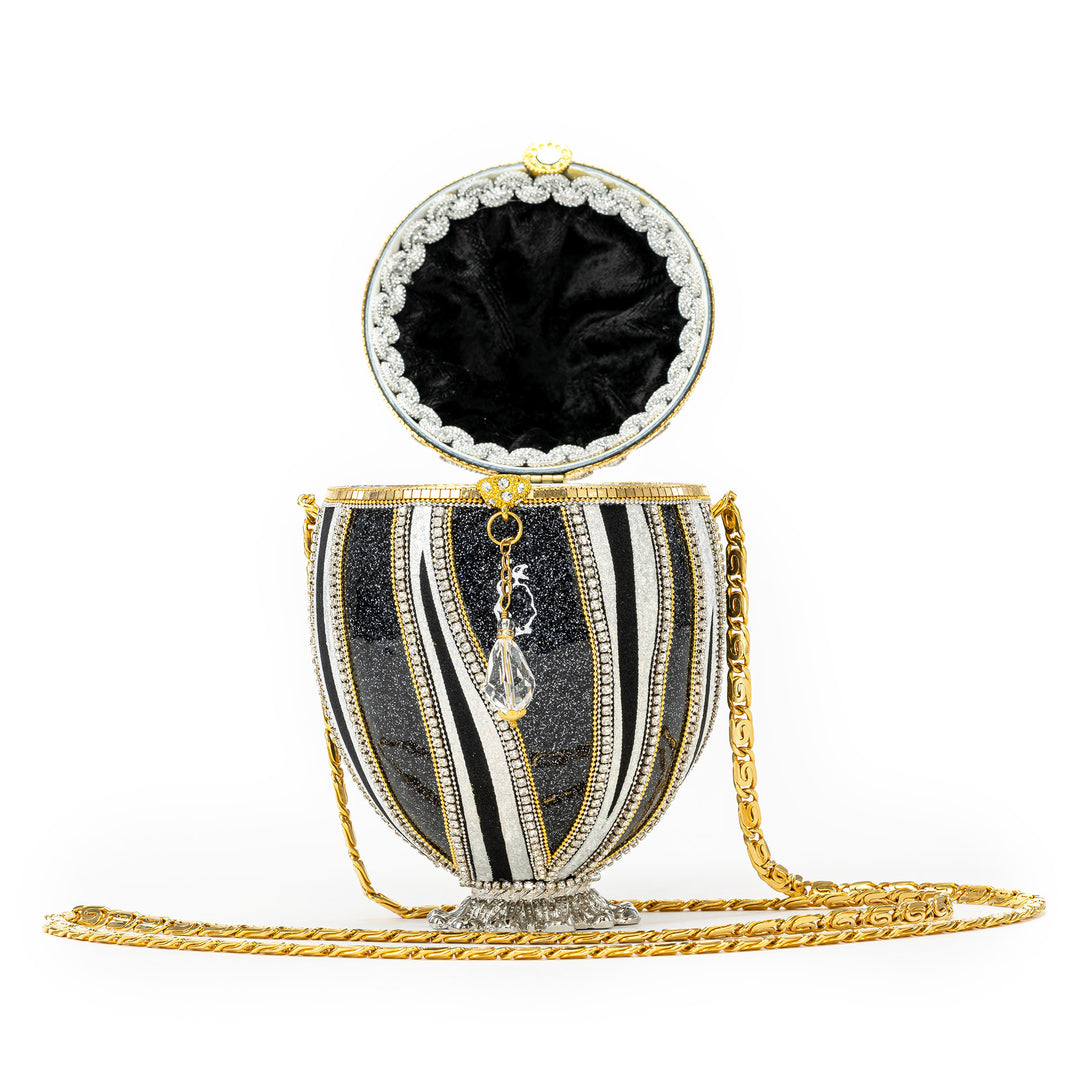 The Egg Fantasy Emu Egg & Crystal Purse part of the  exquisite Egg Fantasy collection is handcrafted in the USA from natural ostrich, emu, goose, duck, and quail eggs. Image #2