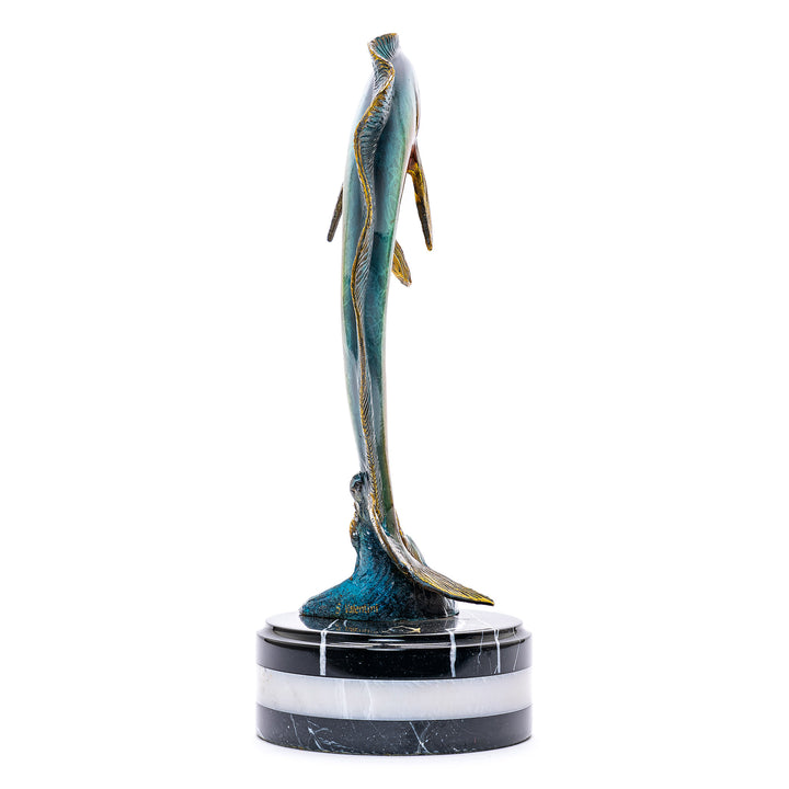 Bronze fish art on polished marble base