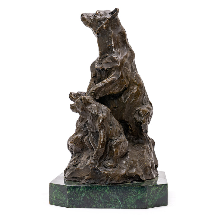 Wildlife sculpture with bears on green base