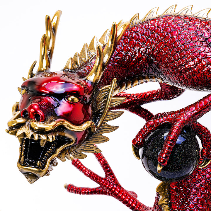 Lamborghini and Ferrari red paint on bronze dragon by Muzika