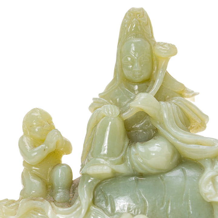 Antique Kwan Yin riding elephant with children statue
