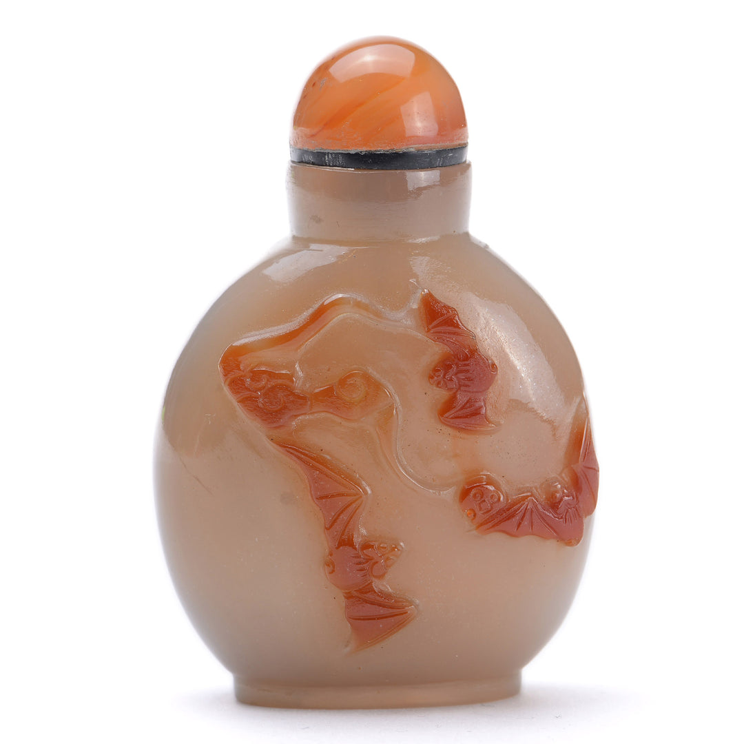 Agate snuff bottle with carved bat motif in relief