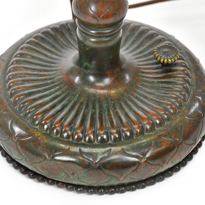 Rich brown patina base with decorative beading detail