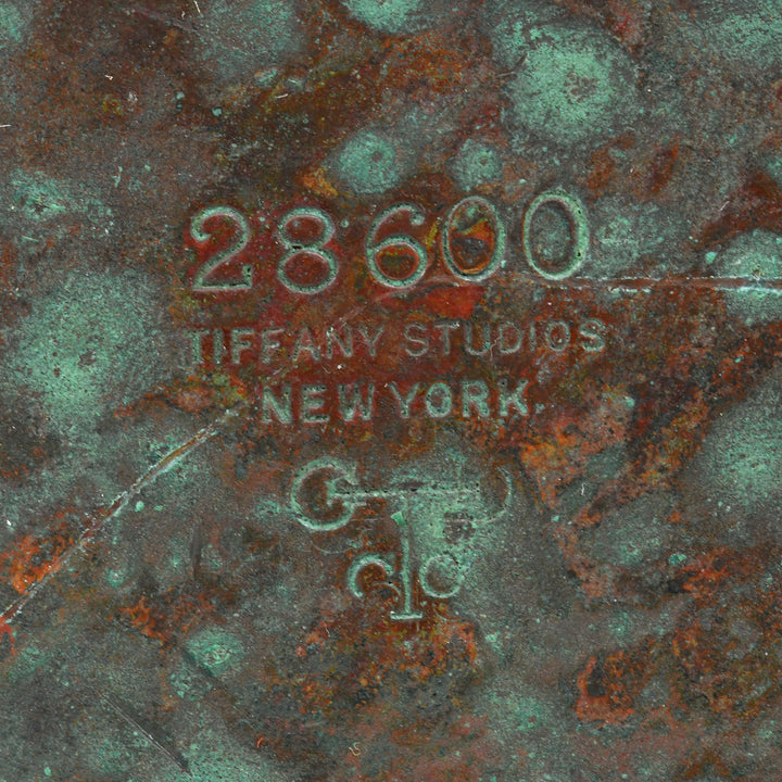 Close up of Tiffany Studios signature and model number