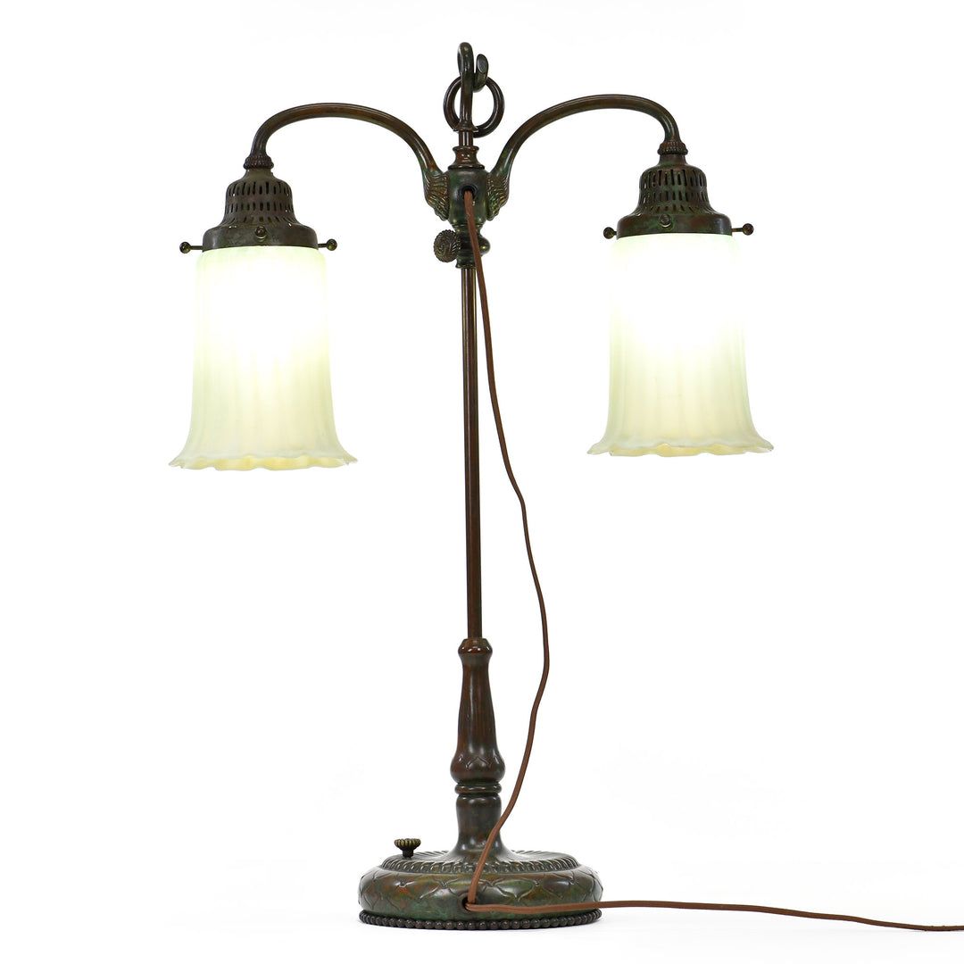Vintage bronze base lamp with verdigris green and red highlights